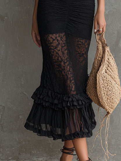 Vestido midi negro de encaje transparente con cuello halter, romántico y bohemio